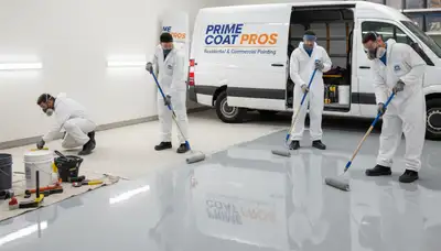 Epoxy garage floor coating by pro painters in Saint Petersburg FL for durable, glossy concrete finish
