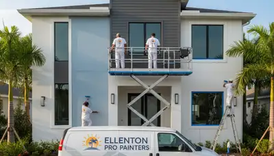 Professional house painters working on a residential exterior in Saint Petersburg, FL