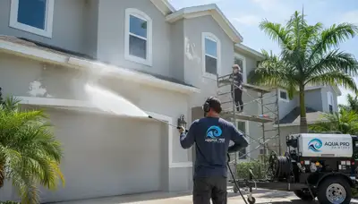 Professional pressure cleaning on a Saint Petersburg FL home exterior restoring siding and driveway surfaces